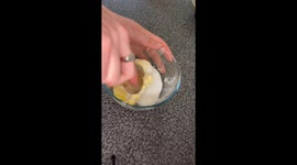 Man shows the technique for crafting nutty pistachio millionaire's shortbread with elegance