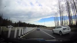 Dashcam Captures Car Swerving Onto Median