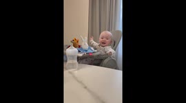 Child stops crying after cheese slice lands on their head