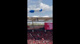 Parachutist Gets Stuck on Stadium Roof