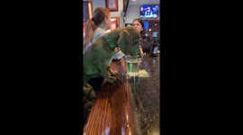 Dachshund Enjoys a Double Shot of Water
