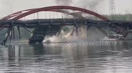 Shocking moment bridge in China collapsed after a devastating fire