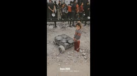 Gaza Strip, Palestine: Palestinian children line up for a free meal in Beit Lahia, Gaza Strip