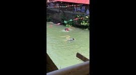 Huge python appears in river as locals swim in the Philippines
