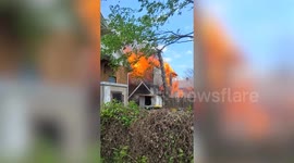 Man runs into burning home to save pet dog