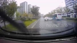Car skids out of control on wet road in China