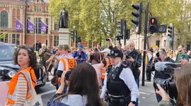 Just Stop Oil Clash with Motorists as they Block Road Outside Parliament. London, UK 26/04/2025