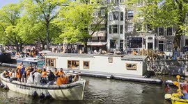 Boats in the canals of Amsterdam during the Kings day celebrations on 26 April 2025