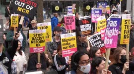 Leftist protesters chant