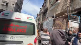 Civil defense teams evacuate wounded Palestinians following Israeli strikes