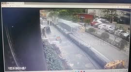 Man cheats death by inches as giant crane collapses at construction site in China