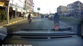 Bungling scooter rider swerves across road causing accident