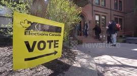 Canada: Canadians head to ballot box with 2 parties in tight race to form next government (2)