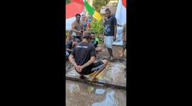 Man falls into muddy puddle while playing traditional game on Lembata Island