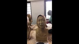Sculptures of students pulling funny faces are a hit at university