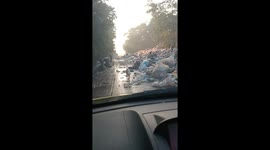 Road blocked by huge piles of garbage in southern Thailand