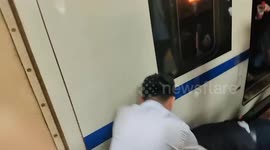Station guard rescues child trapped between train and platform