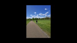 Strangers play chalk Tic-Tac-Toe at Hyde Park in London
