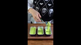 Girl bakes Halloween cakes for a spooktacular celebration at home