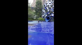 Hero onlooker rescues two drowning girls from swimming pool