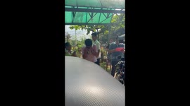 Son cries as he receives a motorbike as gift from his mother