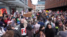 US: Protesters rally outside Tesla showroom in New York amid global campaign
