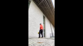 Soccer Player Kicks Ball Into Rafters