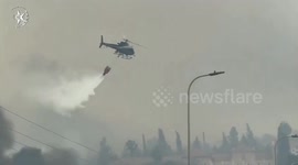 Israel: Israel evacuates several towns, calls for int'l help to fight heat-driven wildfires
