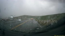 Dashcam Captures Lightning Striking Power Line