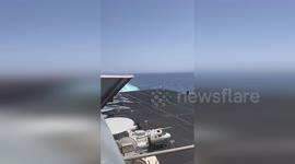 Yemen: Jet Breaks Sound Barrier Over USS Eisenhower in Dramatic Video