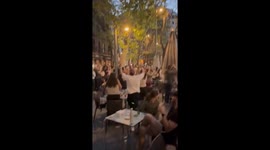 Residents cheer as power returns following outage in Spain