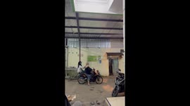 Sisters sent toppling off the back of motorcycle as it rises up
