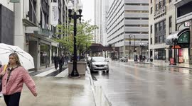 4K videos of Chicagoans commuting to work with morning rain