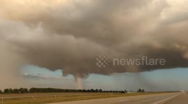 rapidly rotating wall cloud near Egypt Arkansas