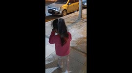 Child's reaction to collecting dog poop in Argentina