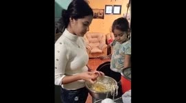 Child breaks egg on woman's face in Santiago after playful challenge