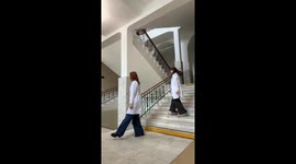 Boy falls down stairs in background of dance video in Ufa