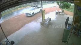 Vehicle rolls backward in rain before driver stops it in Sisaket Province