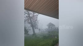Storm chaser catches tornado whipping past his truck