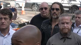 Russell Brand enters Westminster Magistrates Court in London to face charges