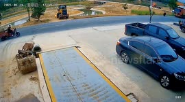 Runaway tyre smashes through store's glass doors, startling shopkeeper