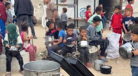 Charity distributes food to displaced Palestinians in Gaza City amid worsening hunger