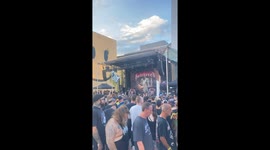 Metal Fan Doesn’t Appreciate Headbanging in the Beer Line