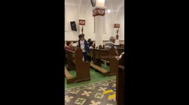 Pup Attentively Listens To Church Service