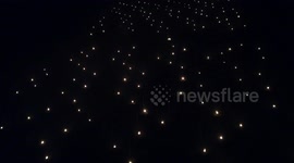 Farming brothers use hundreds of candles to keep fragile apricot trees warm