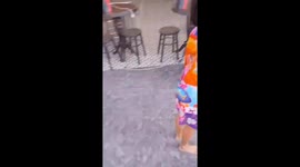 Woman gives birth outside shop in Thailand