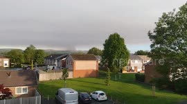 UK: Smoke of Peak District Wildfire Seen From Greater Manchester