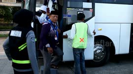 A number of Indonesian Muslim pilgrims prepare to board a passenger plane before heading to the holy city of Mecca to perform the annual hajj pilgrimage at Sultan Mahmmud Badaruddin II International airport in Palembang, Indonesia on May 3, 2025. Hajj is