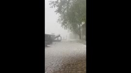 Historic Paris Streets Blanketed in Hail as Rare May Storm Causes Citywide Disruptions