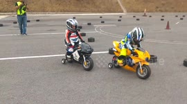 Kids on Motorbikes Fall in Sync